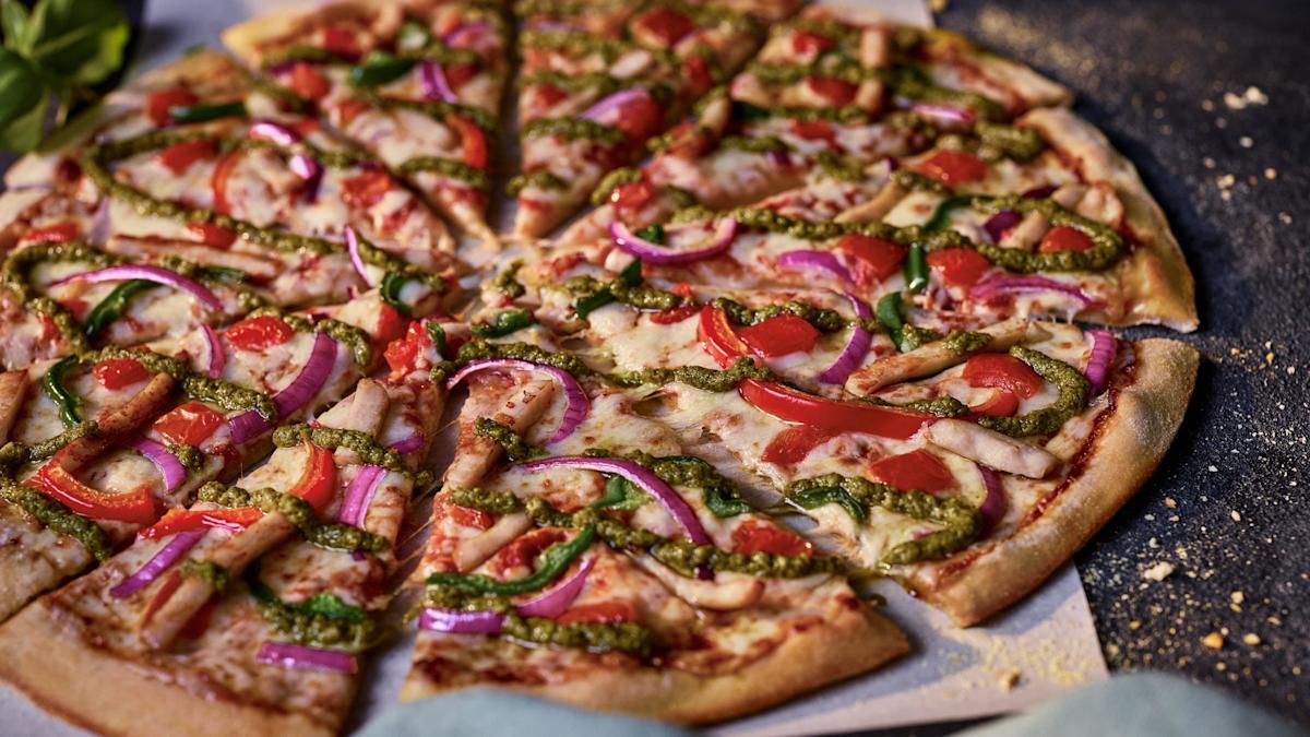Domino’s takes on restaurant rivals with new range of thinner pizzas