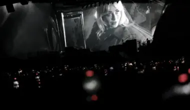 Sabrina Carpenter appears on the screen as she performs at the Coachella Valley Music and Arts Festival in Indio, California, U.S., April 10, 2026.