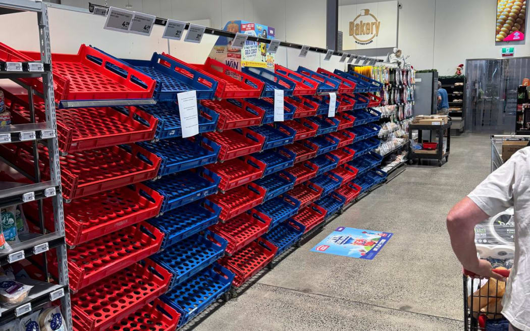 Shelves at New World in Whangamatā are bare after slips caused issues on main routes around the town.
Photos: Supplied