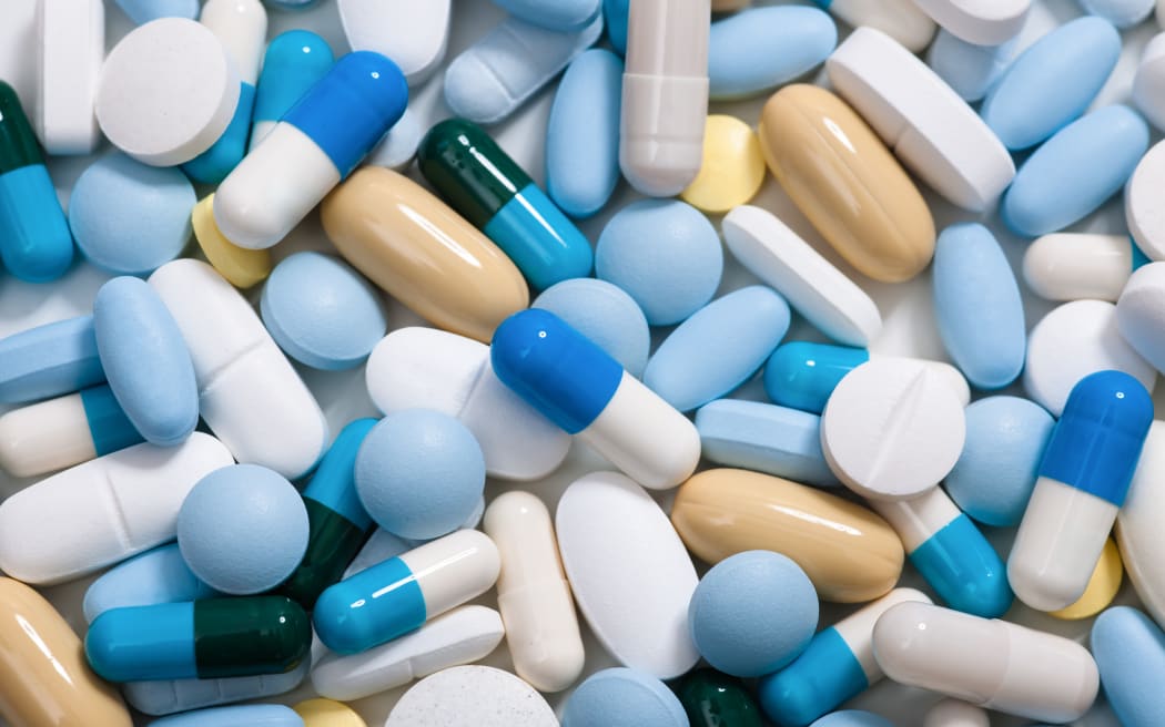 Heap of medicine pills. Background made from colorful pills and capsules