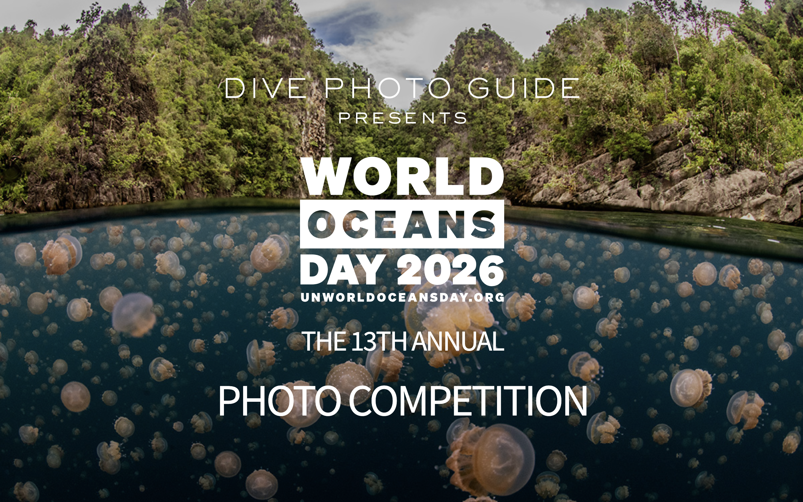 Alt text: "Promotional image for the World Oceans Day 2026 Photo Competition by Dive Photo Guide. Background shows a serene lake filled with jellyfish, surrounded by lush green cliffs under a partly cloudy sky