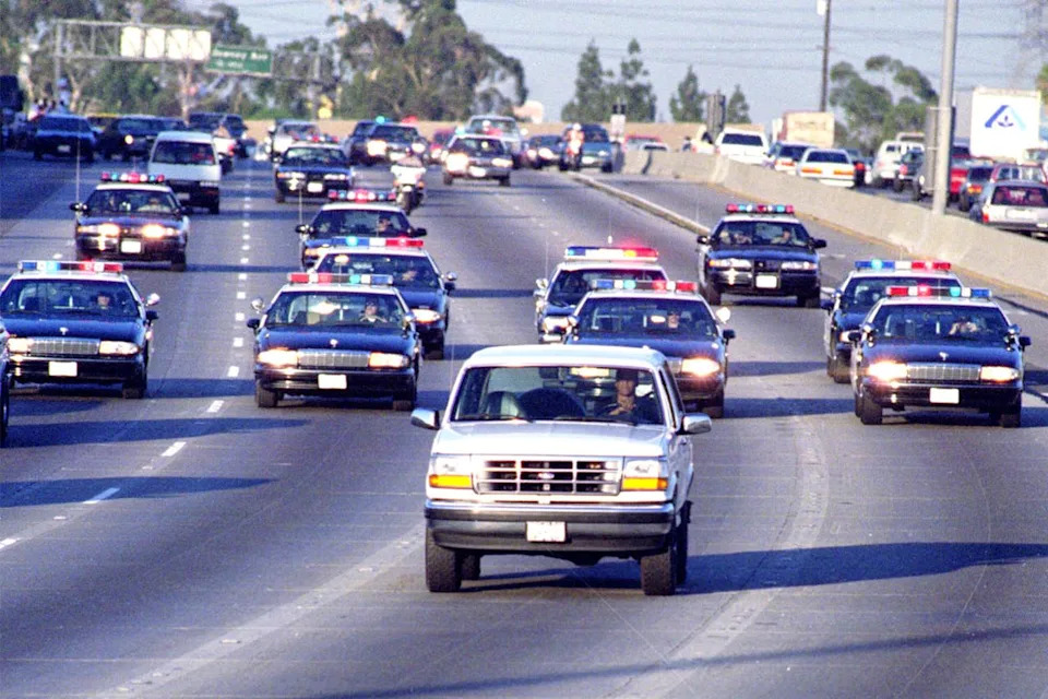 California Highway Patrol chase Al Cowlings, driving, and O.J. Simpson, hiding in rear of white Bronco on the 91 Freeway, just West of the I5 freeway. The chase ended in Simpson's arrest at his Brentwood home.Credit: Allen J. Schaben/Los Angeles Times via Getty