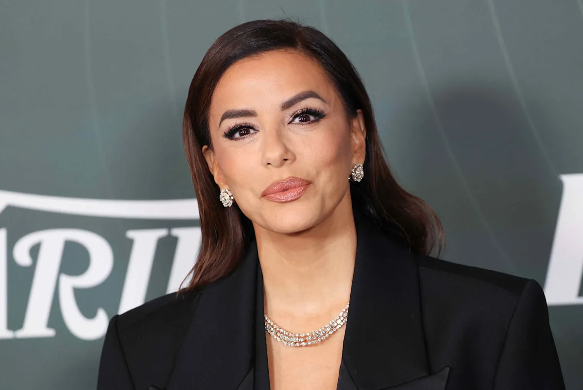 Eva Longoria Pairs Her Unexpected Pantsuit With a Plunging Bustier Top
