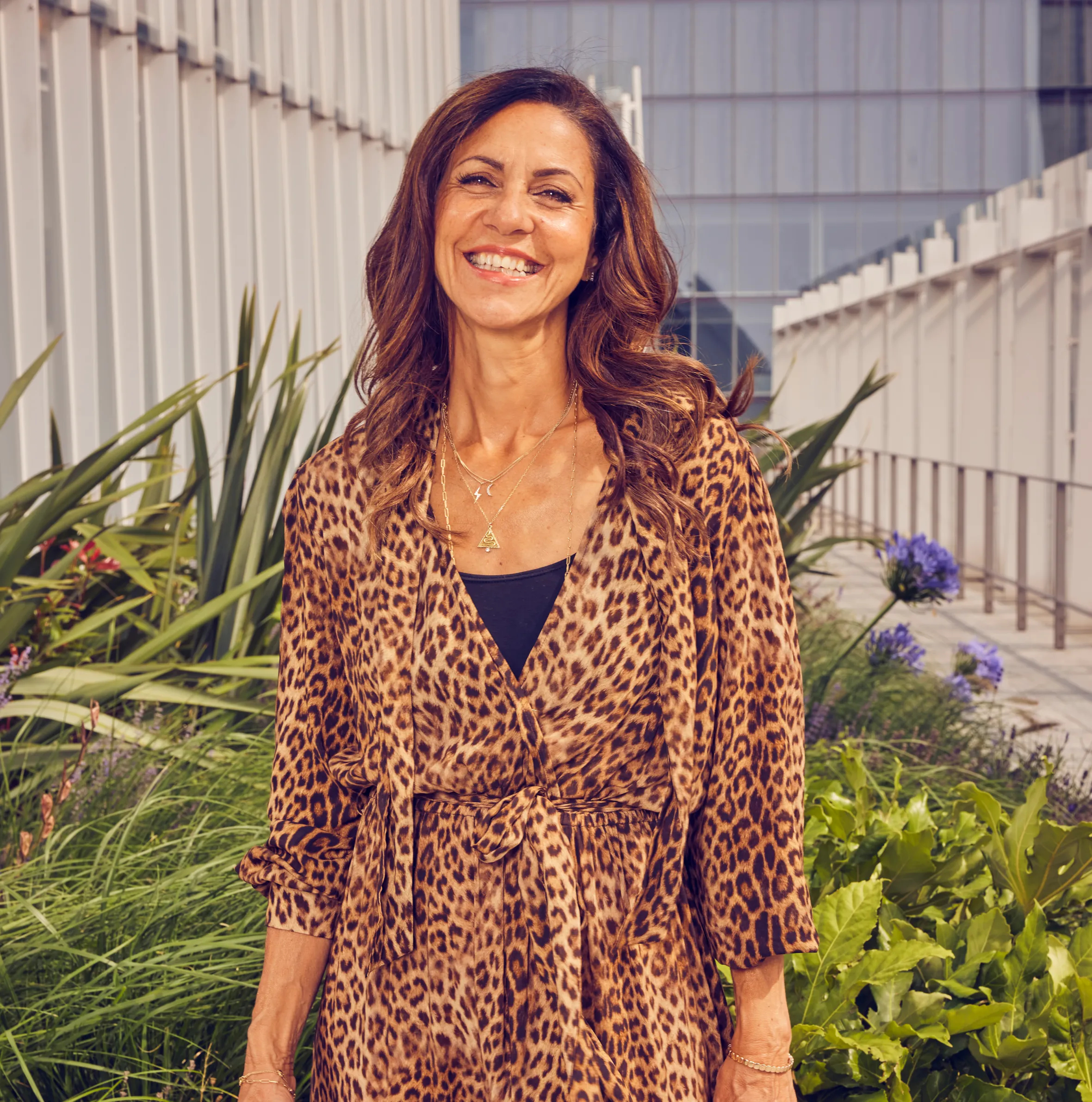 Julia Bradbury wearing a leopard print dress.