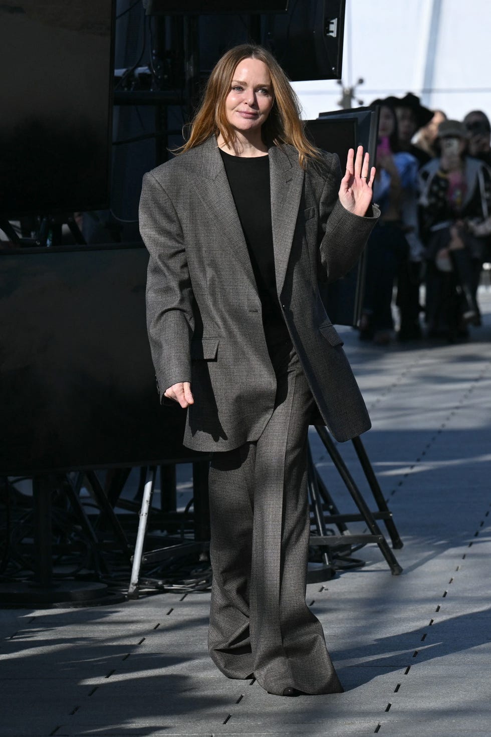 british fashion designer stella mccartney acknowledges the applause at the end of her show after presenting a creation by stella mccartney for the women ready to wear fall winter 2024/2025 collection as part of the paris fashion week, in paris on march 4, 2024. (photo by miguel medina / afp) (photo by miguel medina/afp via getty images)