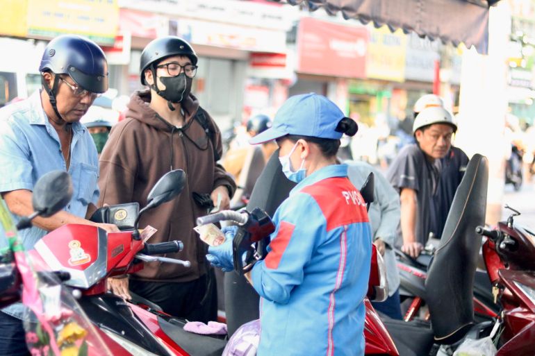 A commuter refuels at a Ho Chi Minh City petrol station on March 27. Govi Snell _ Al Jazeera_-1775367397