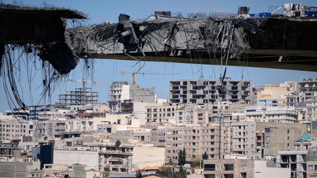 A bridge struck by US airstrikes on Thursday is seen in the town of Karaj, west of Tehran, Iran, Friday, April 3, 2026