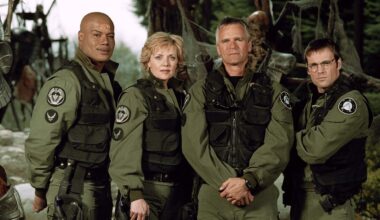 Screenshot from Stargate SG-1 showing the four main cast members in military attire.