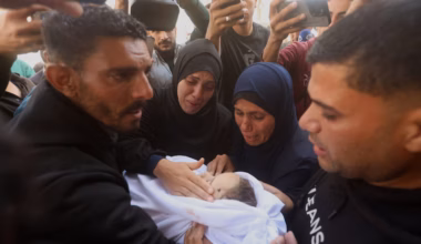 Palestinians hold funerals for pregnant woman and her children killed in Israeli strikes