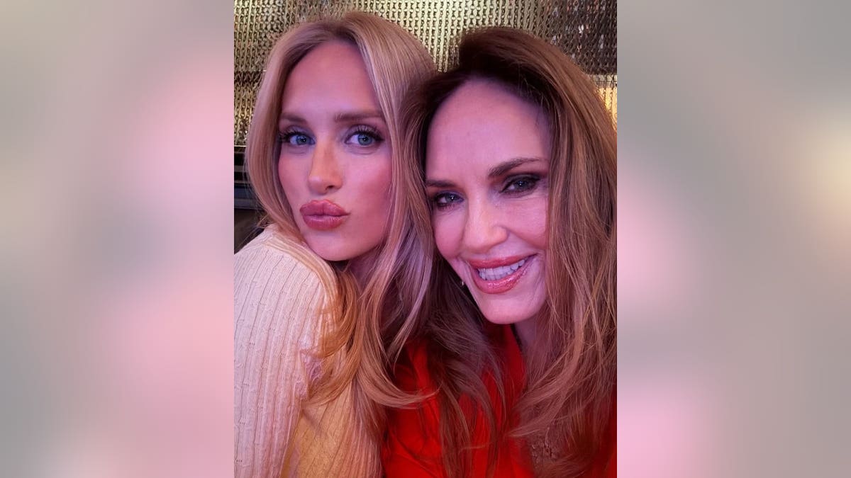 Catherine Bach and a friend taking a selfie inside a Nashville restaurant.