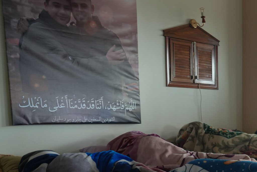 A poster on the wall of the Ambulance Association commemorates medical volunteers killed in an Israeli attack (Lina Malers)