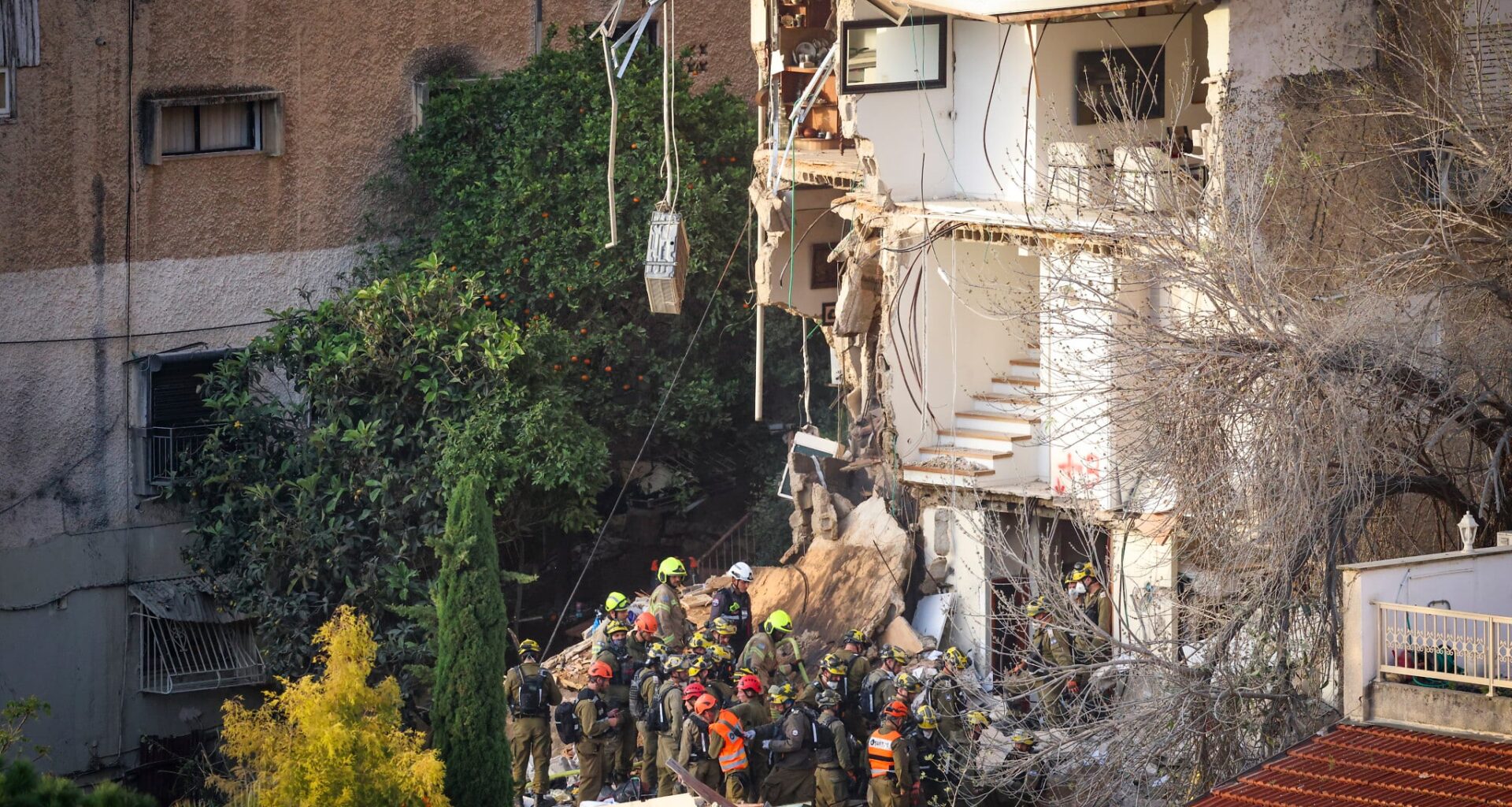 2 dead found in wreckage of Haifa building hit by missile; 2 more people still missing