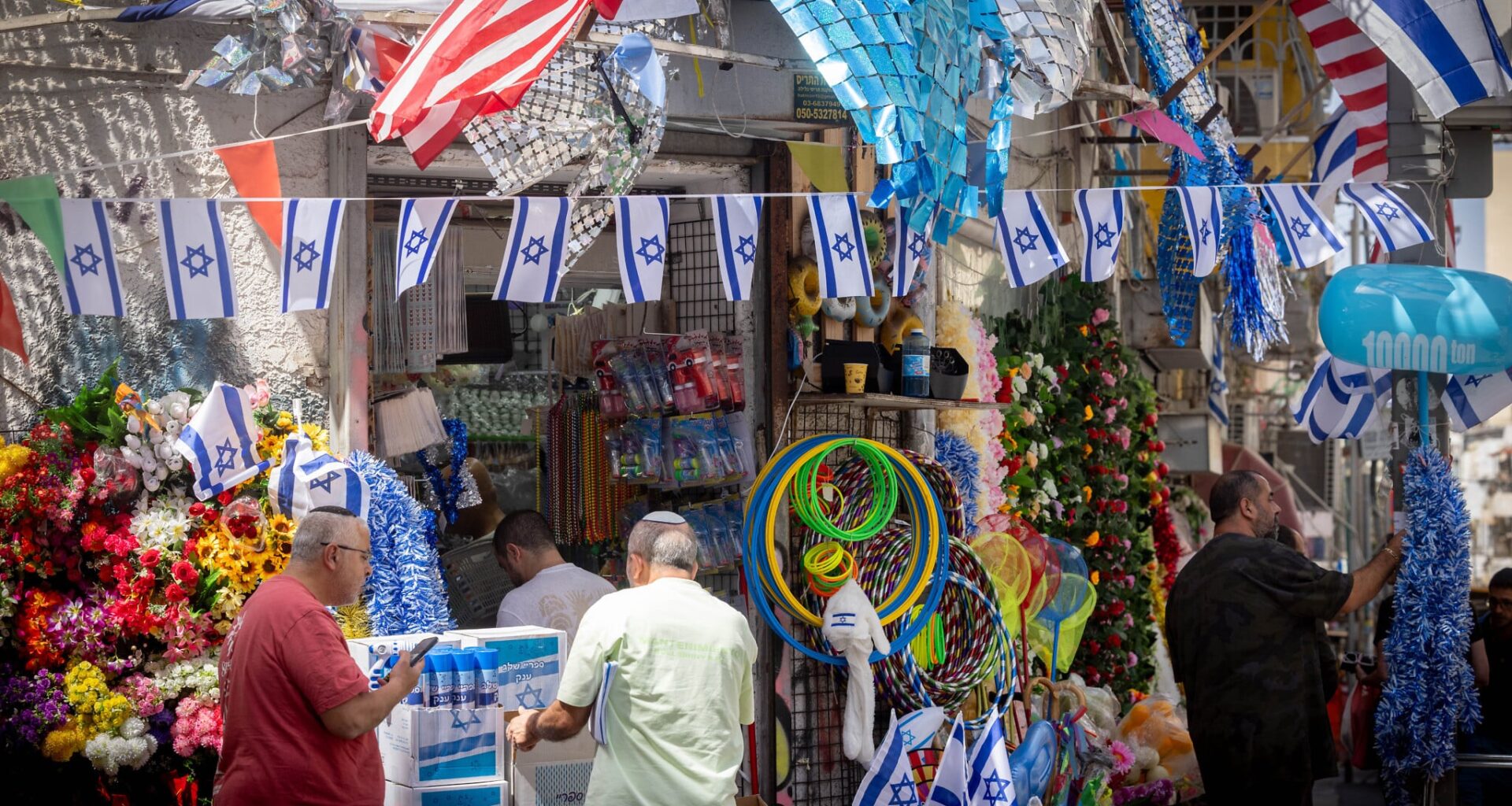 Restrictions lifted, but war clouds put damper on Independence Day plans