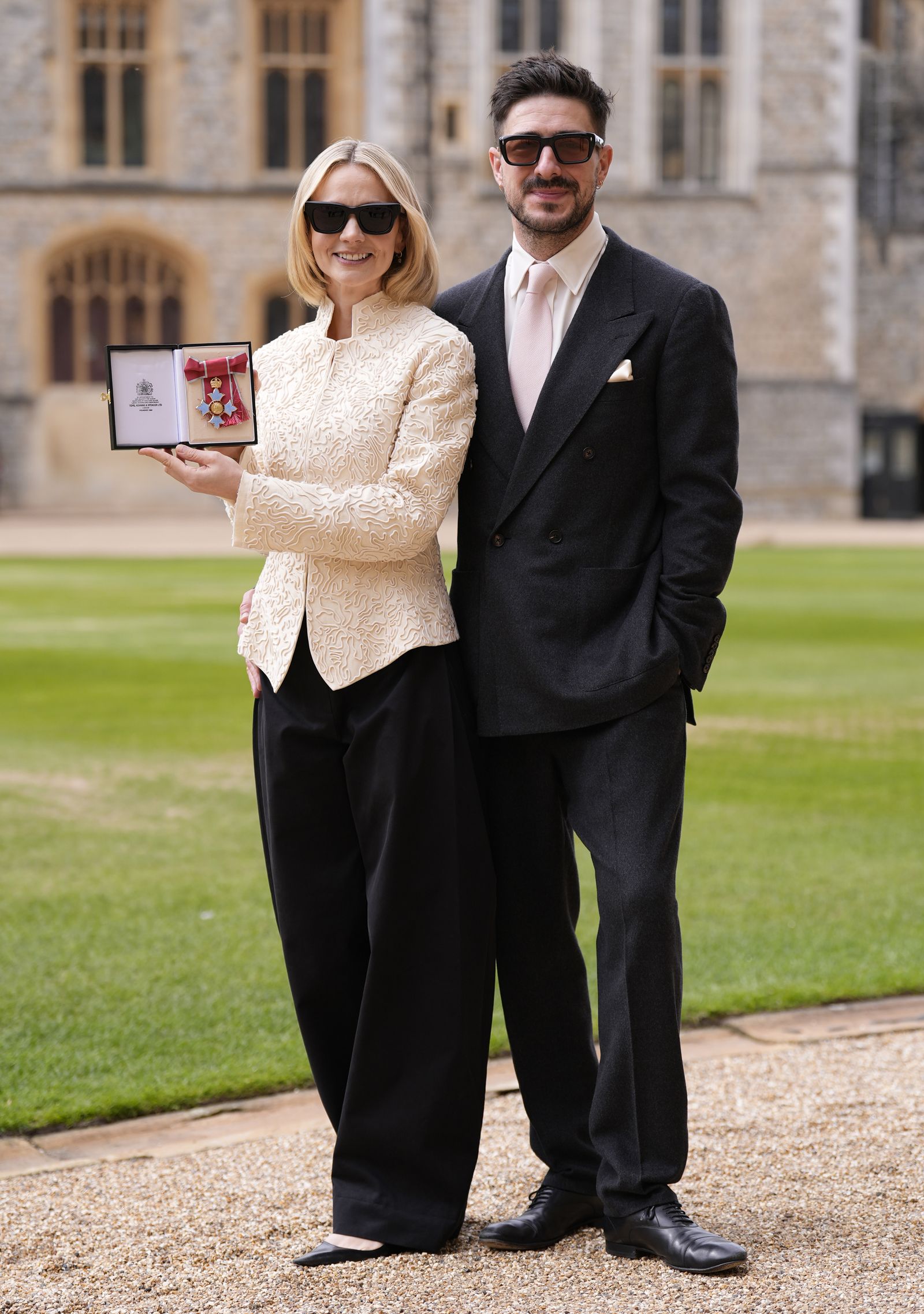 Image may contain Lenny Von Dohlen Carey Mulligan Blazer Clothing Coat Jacket Formal Wear Suit and Photography