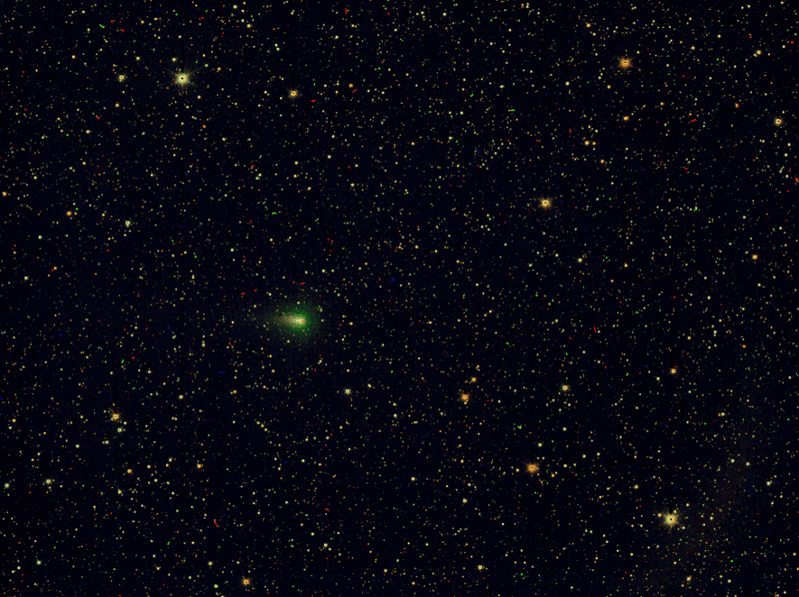 Greenish light against a starry background