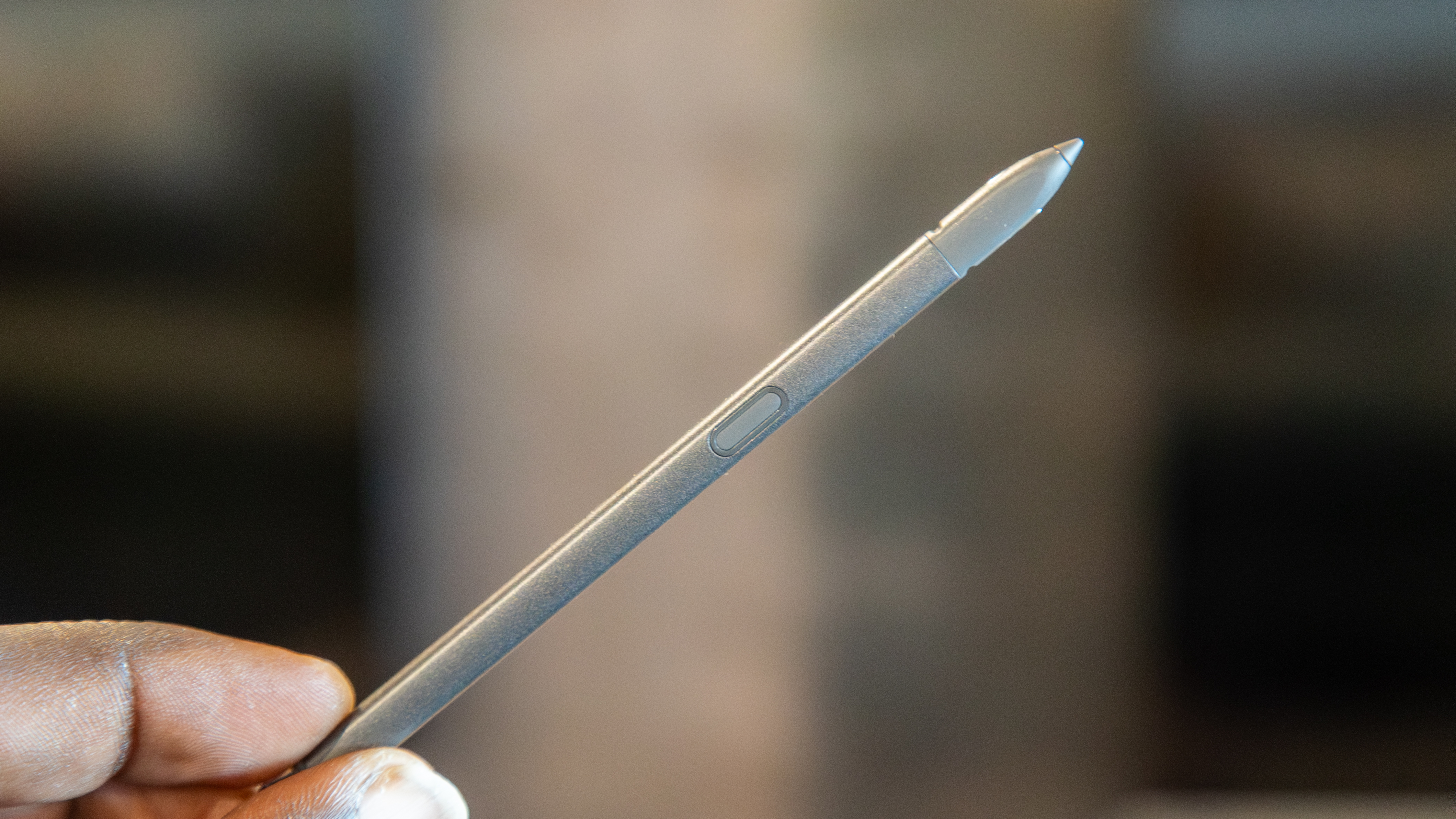 Holding the stylus of the Moto G Stylus 2026