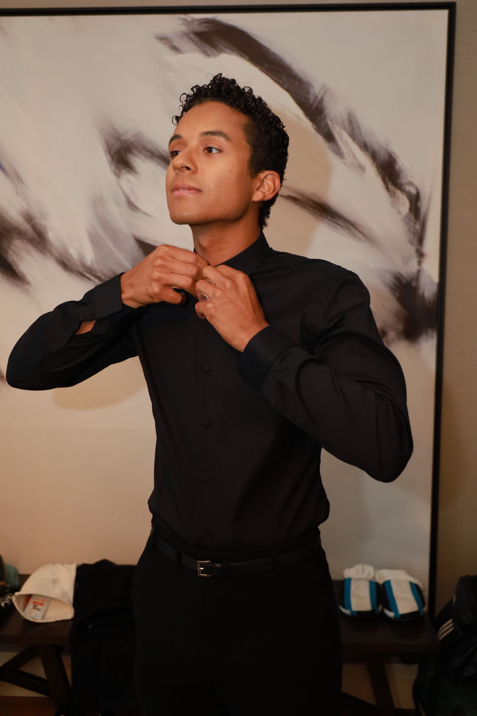 Image may contain Face Head Person Photography Portrait Black Hair Hair Adult Clothing Shirt and Sleeve