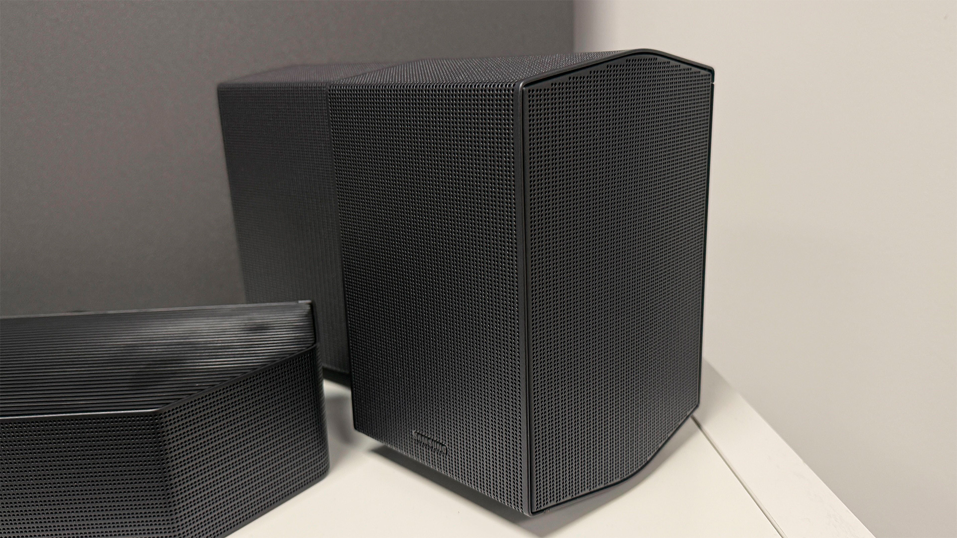 Samsung HW-Q990H soundbar package showing soundbar and surrounds