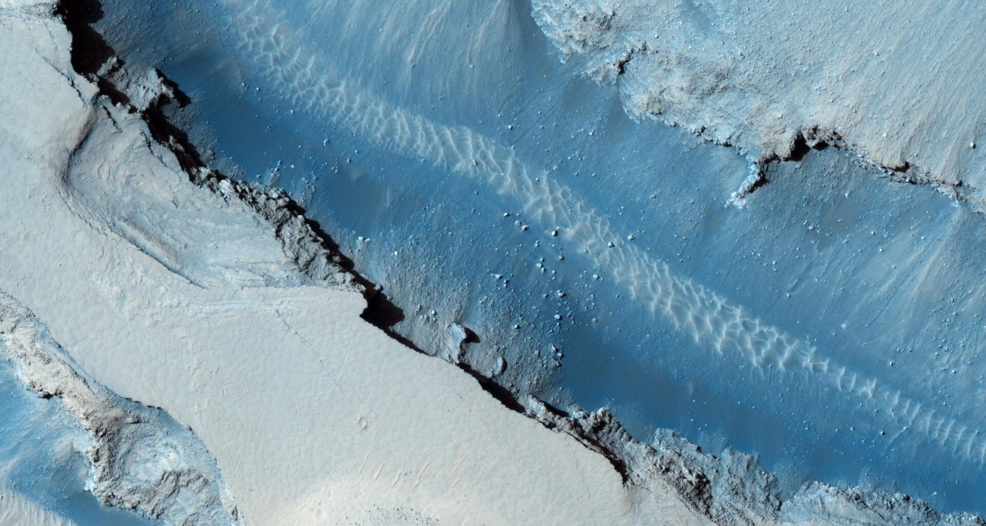 Image of part of Cerberus Fossae near the Athabasca Valles takes by the Mars Reconnaissance Orbiter. Credit - NASA / JPL-Caltech / University of Arizona