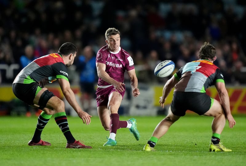 Sale Sharks' George Ford (centre) passes the ball during the Investec Champions Cup round of sixteen match at Twickenham Stoop, London. Photograph: Ben Whitley/PA Wire