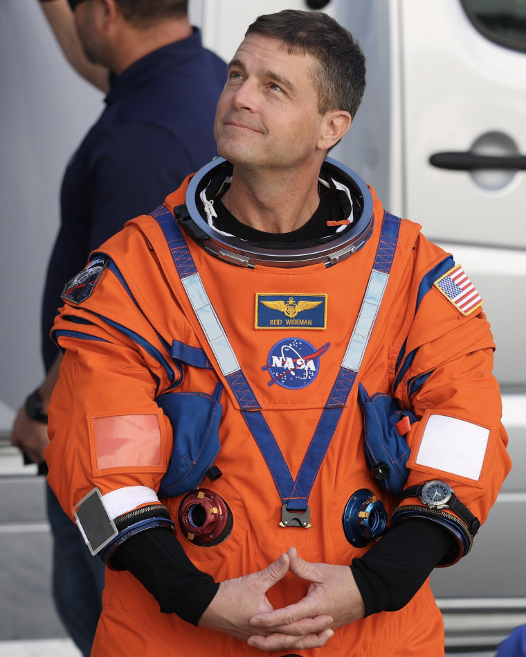 Artemis II crew member commander Reid Wiseman during a rehearsal walkout from the Neil A. Armstrong Operations and Checkout Building at NASA’s Kennedy Space Center on December 20, 2025 in Cape Canaveral, Florida.