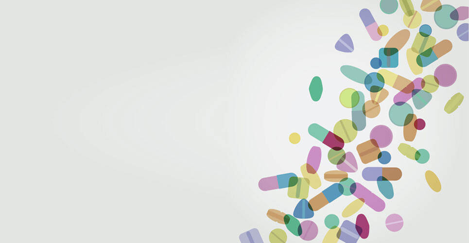 Abstract illustration of colorful pills and capsules scattered diagonally across a light background to illustrate that switching medicine formulation for children has significant cost savings