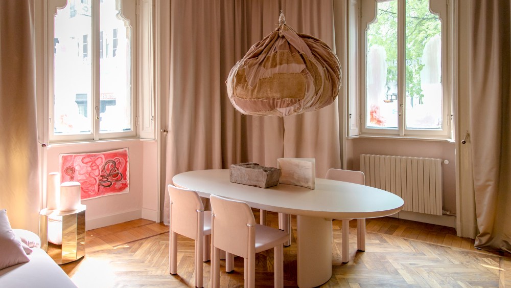 In the main "pink room" she used patchwork offcuts to create a jovial imperfect spherical shape that can be hung from the ceiling. The curation includes Tacchini's new 1809 floor light, the Gianfranco Frattini Grand Sesann sofa and the Torii Love table by Studio Pepe finished in matte powder and pink lacquer.