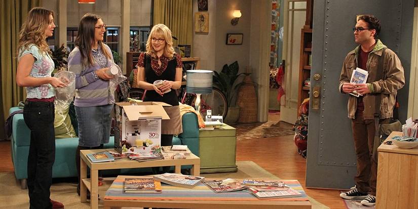 Penny, Amy, Bernadette and Leonard in Penny's apartment in The Big Bang Theory