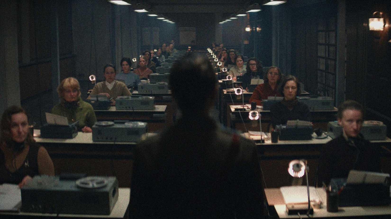 A Star City first look image shows a woman standing in front of a group of Soviets