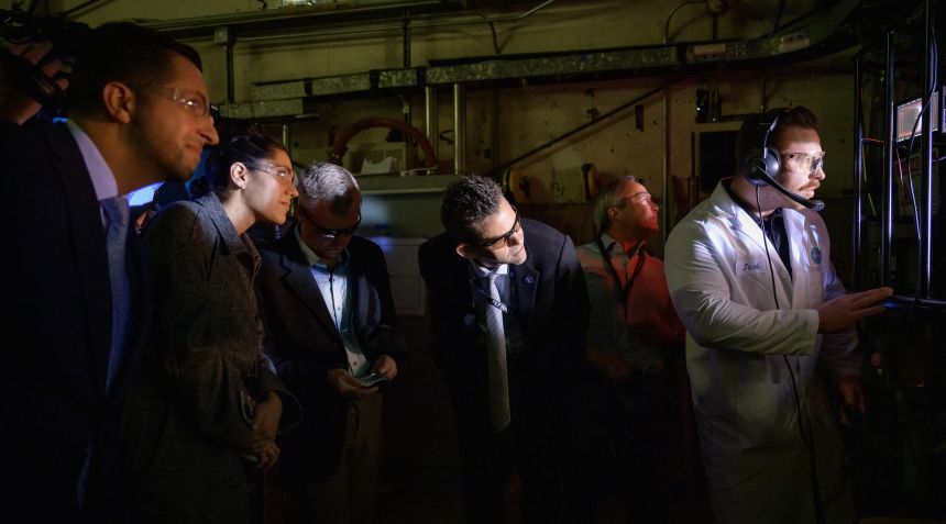 NASA Administrator Jared Isaacman (center) views a test run in the Arc Jet Complex at the Ames Research Center in Moffett Field, California, in January.