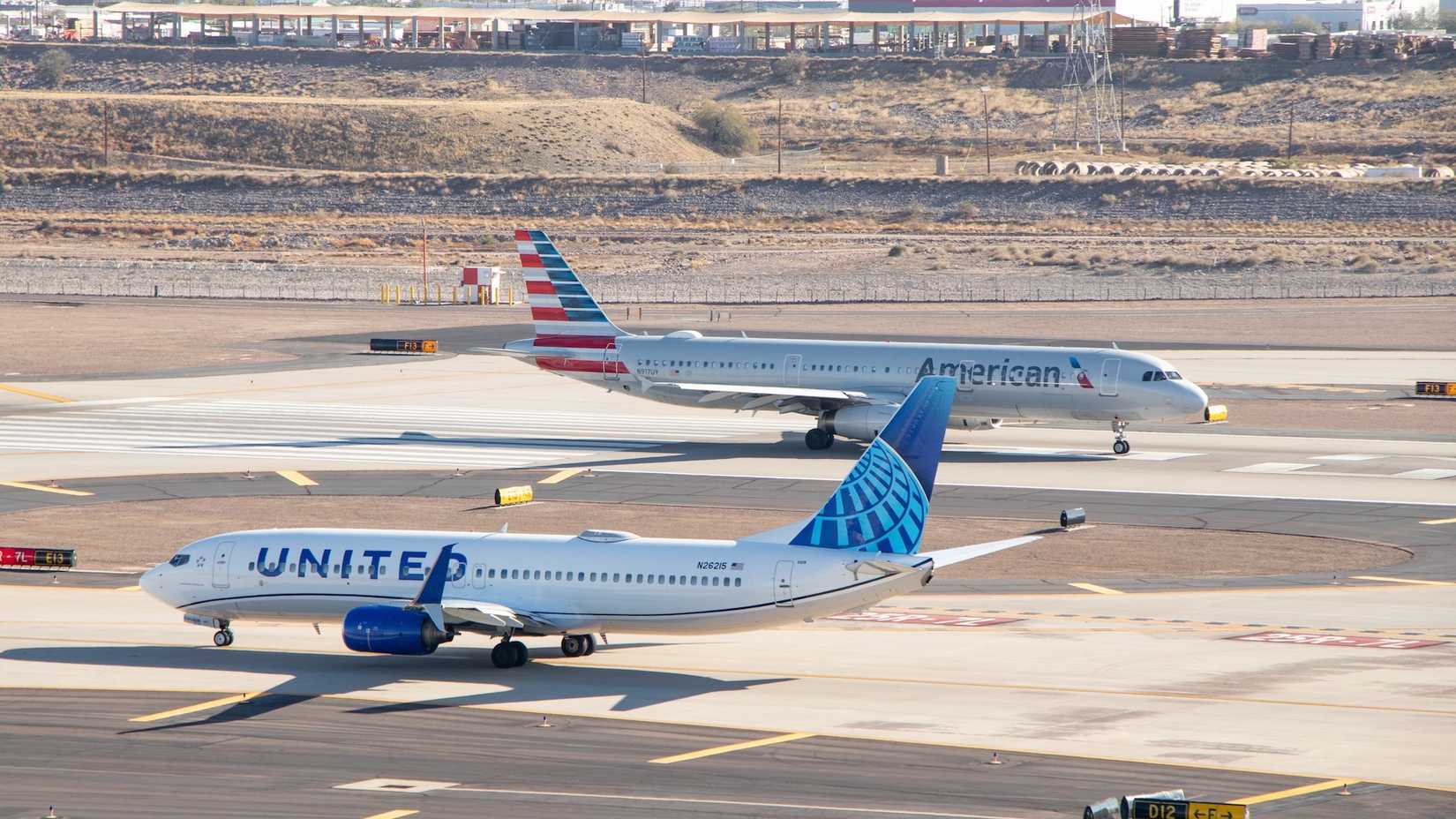 American And United Jets On The Runway