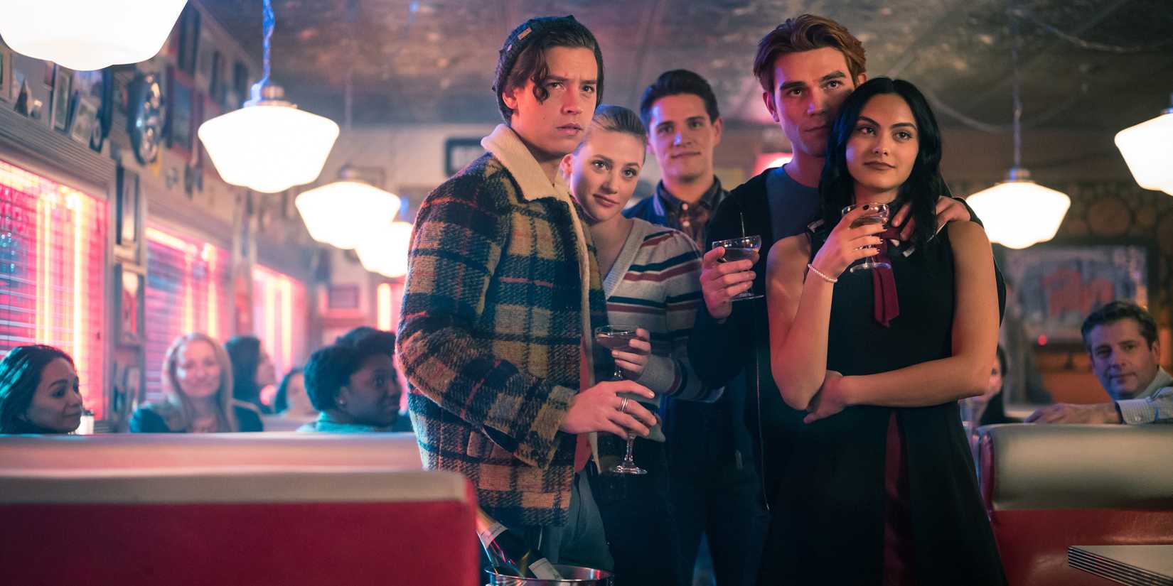 Archie, Betty, Veronica, Jughead, and Kevin standing together in an episode of Riverdale