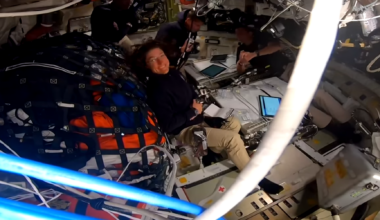 The Artemis II crew floats in Orion; NASA astronaut Christina Koch smiles at the camera as NASA a