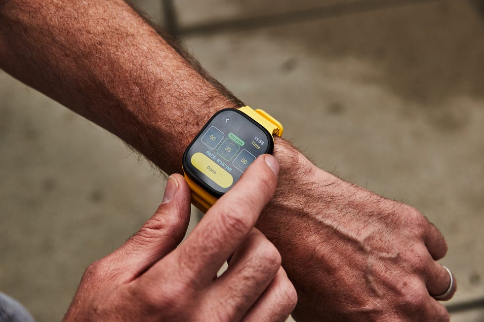 Smartwatch being operated on a wrist. Smartwatch being operated on a wrist.
