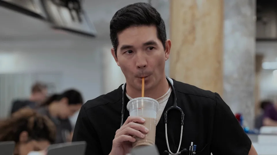 Dr. Shen drinking Dunkin in The Pitt 213