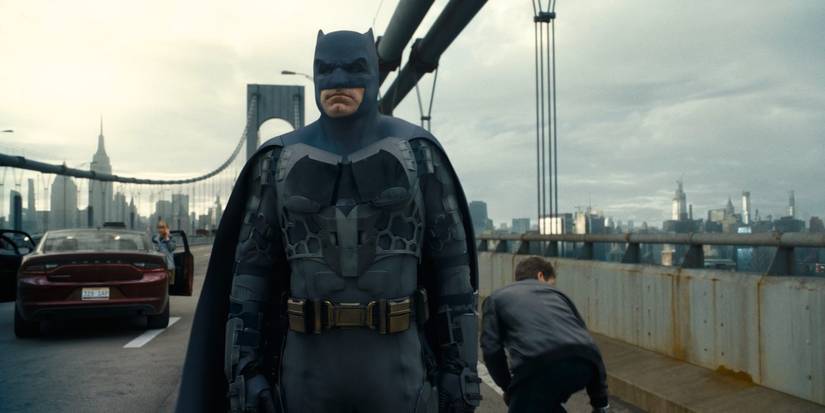 Ben Affleck's Batman stands on a bridge in The Flash