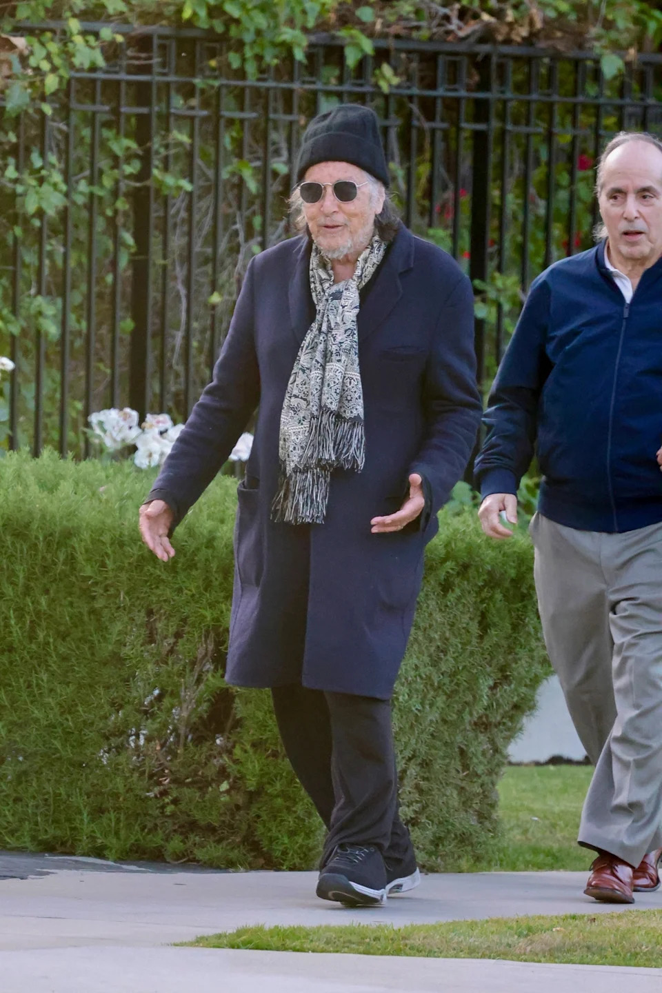 The “Scarface” star matched her vibe in a casual coat with a scarf and beanie. BACKGRID