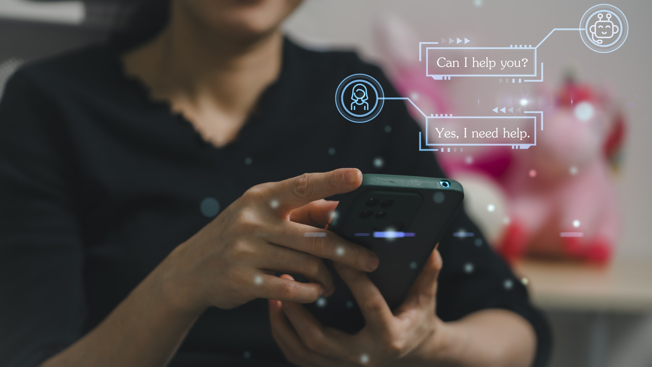 A person looks at their phone. The image is overlaid with graphics showing a chatbot.