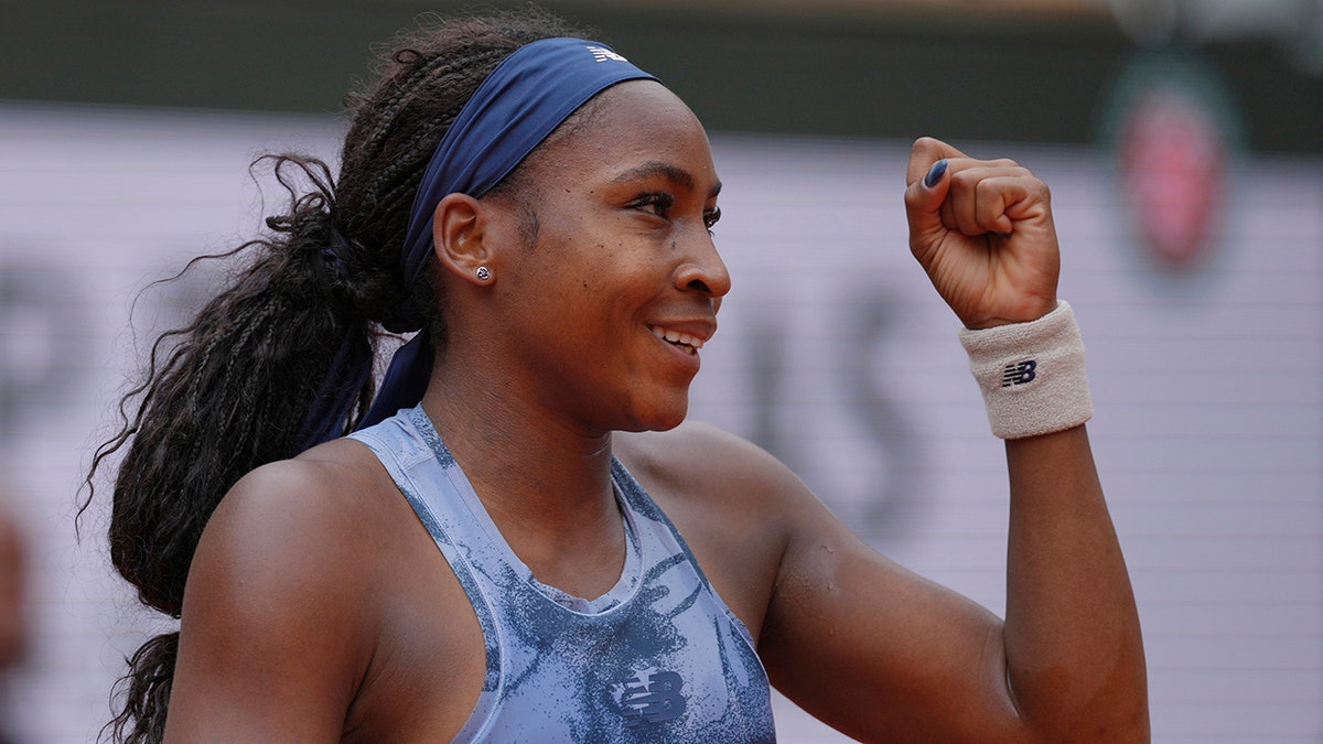 Coco Gauff reacting after winning a point against Olivia Gadecki at Roland-Garros stadium