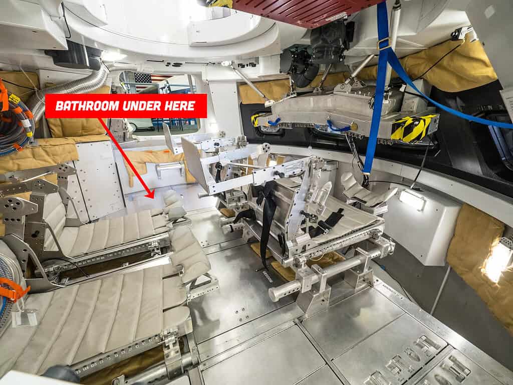 Image of the interior of the Orion capsule for the Artemis mission showing where the bathroom is located