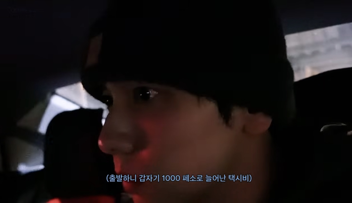 Soobin of Tomorrow X Together is seen in a video posted on April 1. The subtitle reads, ″The taxi fare suddenly increased to 1,000 pesos after departure.″ [SCREEN CAPTURE]