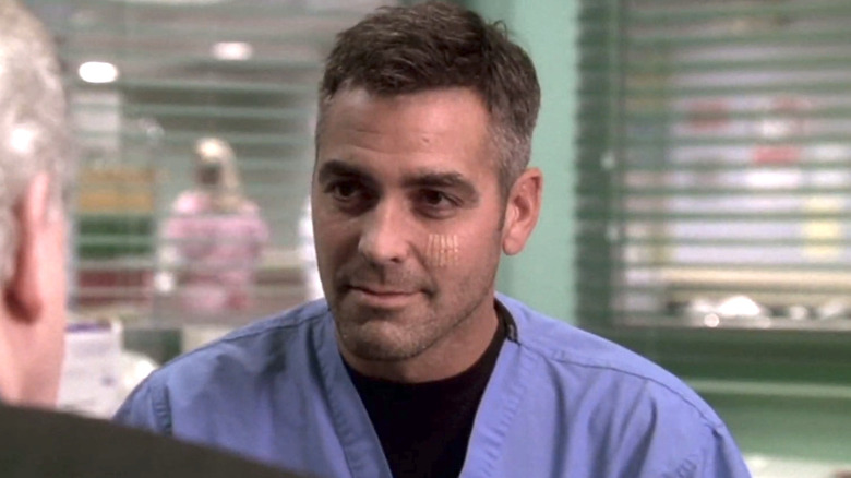 George Clooney as Doug Ross smiles in ER