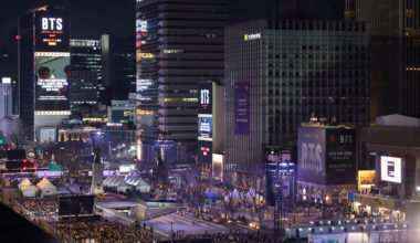 Digital billboards near Gwanghwamun Square in central Seoul display videos of boy band BTS ahead of their comeback performance on March 21. [JOINT PRESS CORPS]