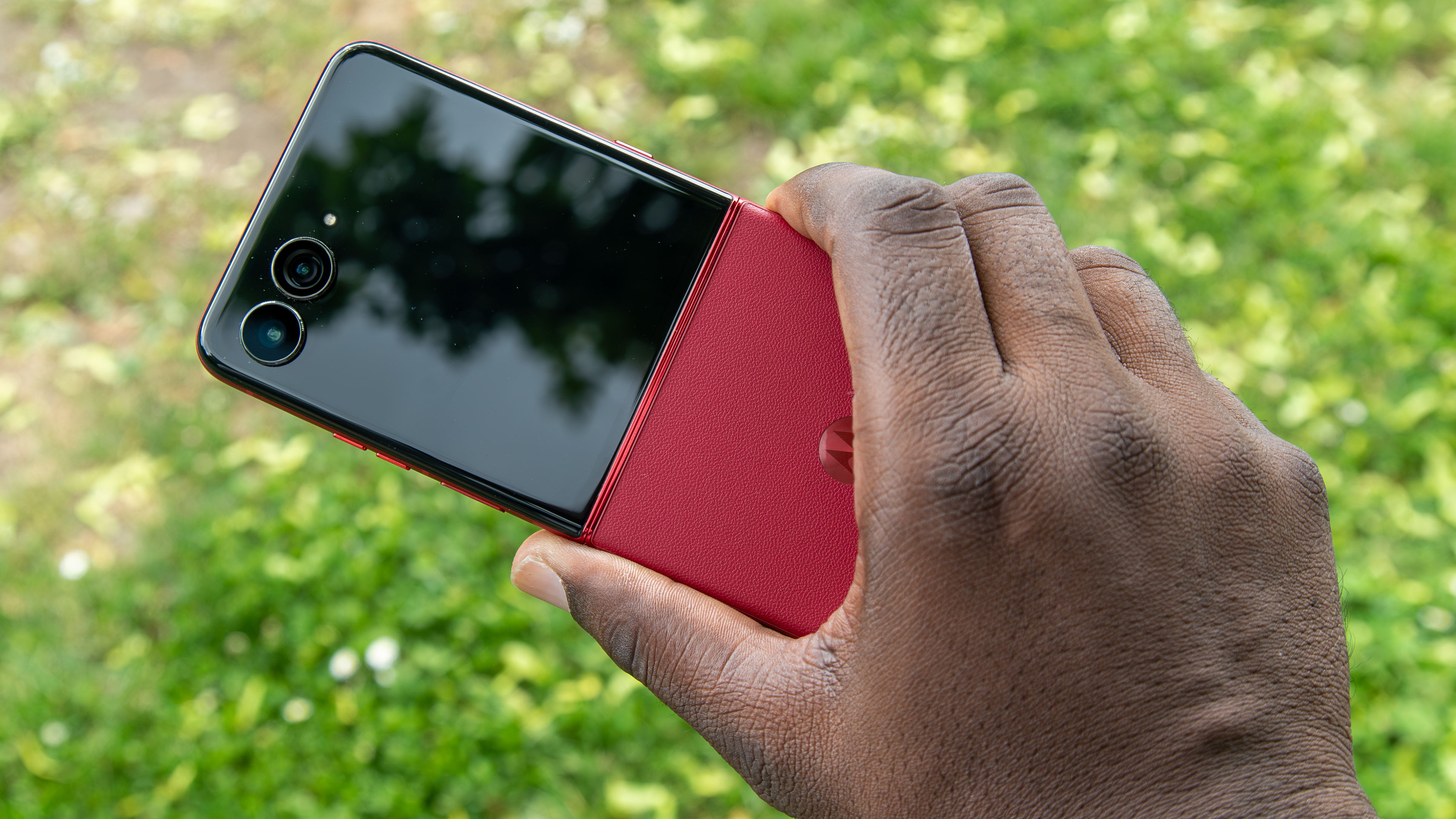 Holding the Razr Ultra 2025 outside