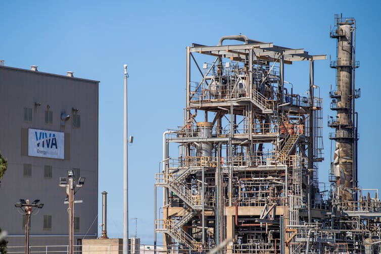 A metal structure that forms part of an oil refinery.