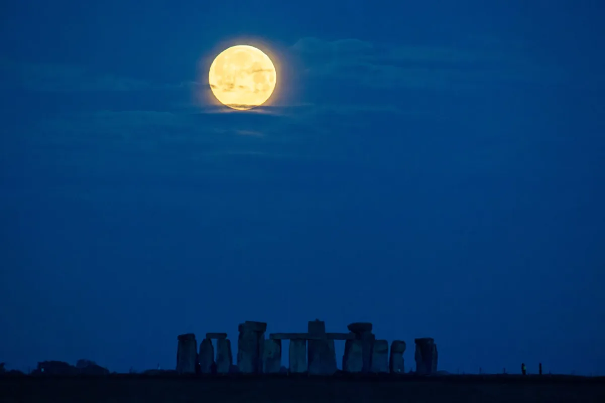 Flower Moon of 2021 over Stonehenge. Credit: Finnbarr Webster / Stringer / Getty Images