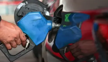 a worker fills a car s tank at a fuel station amid concerns about rising fuel prices linked to the us israel conflict with iran photo reuters file