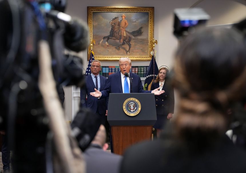 President Donald Trump, alongside Health and Human Services Secretary Robert F. Kennedy Jr., answers questions on September 22, 2025, after federal health officials suggested a link between the use of acetaminophen during pregnancy and autism.