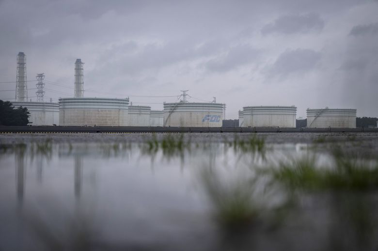Oil storage tanks at Fuji Oil Nakasode Crude Storage Base, one of the sites designated for releasing Japan's national oil reserves, in Sodegaura, Chiba prefecture, on March 25.