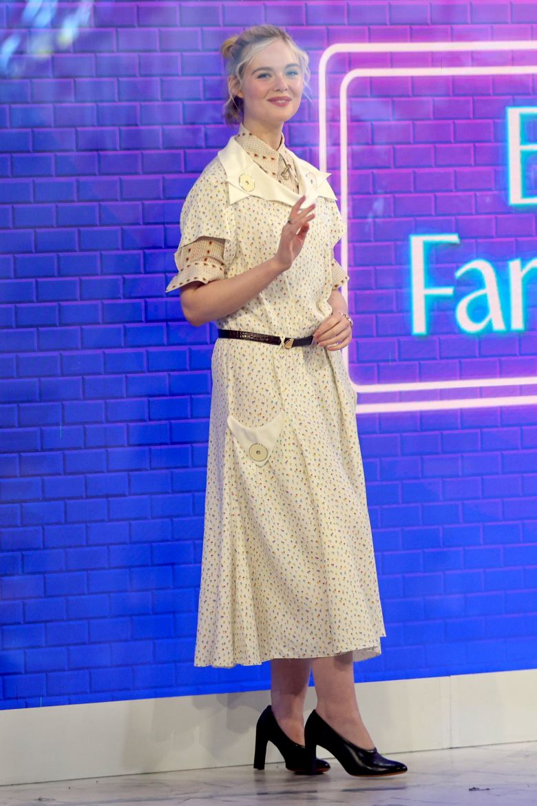 Her press looks have followed this line of ironic, slouchy and kitschy femininity. To the